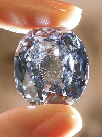 discover the art and science of diamond cutting, from traditional techniques to modern technology. learn how expert craftsmanship shapes raw diamonds into stunning, brilliant gems.